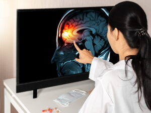 Woman looking at image of brain